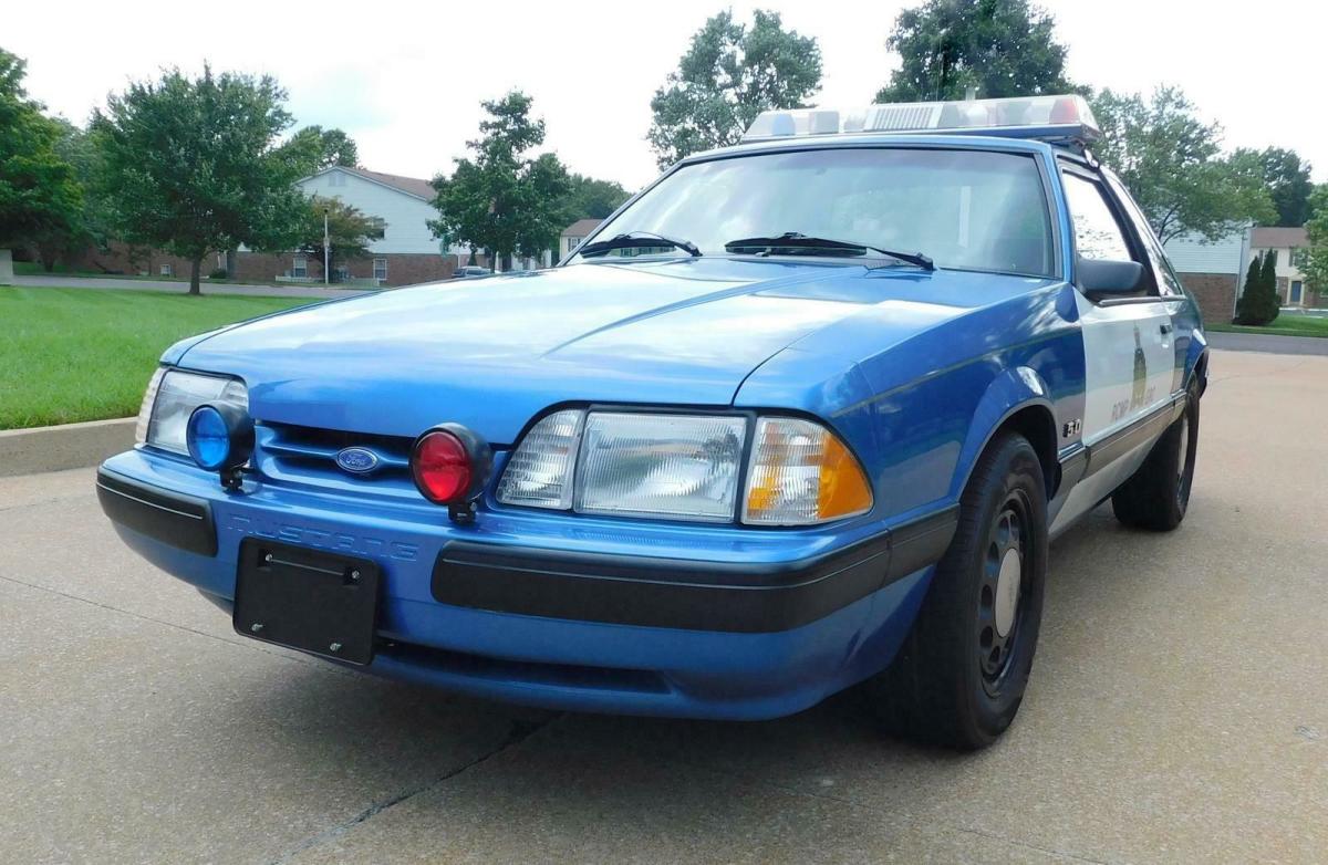 1989 Blue Ford Mustang --