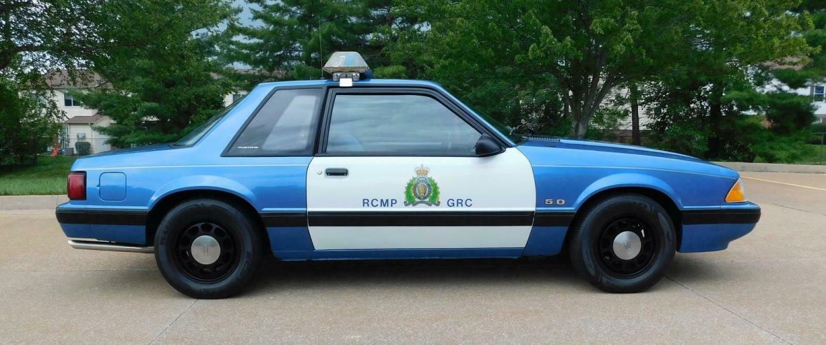 1989 Blue Ford Mustang --