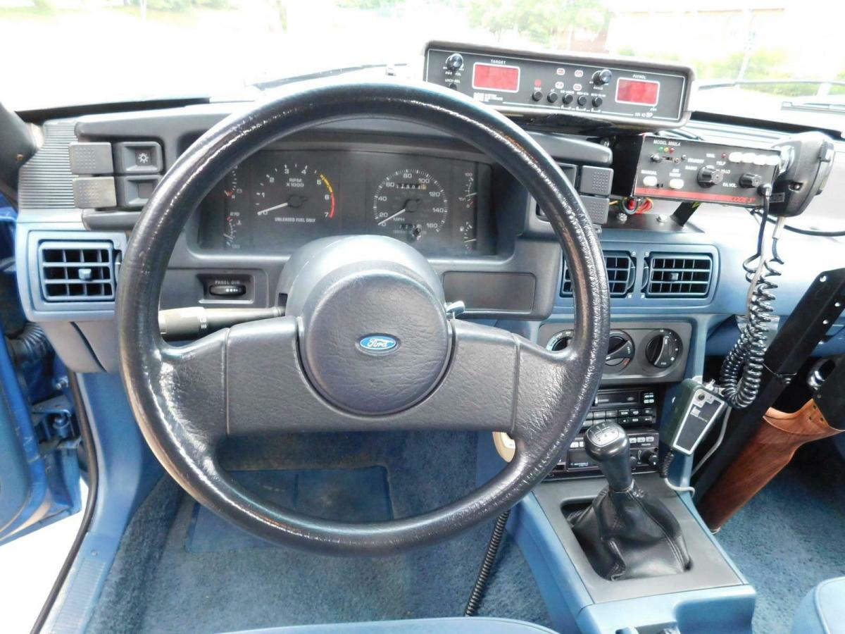 1989 Blue Ford Mustang --