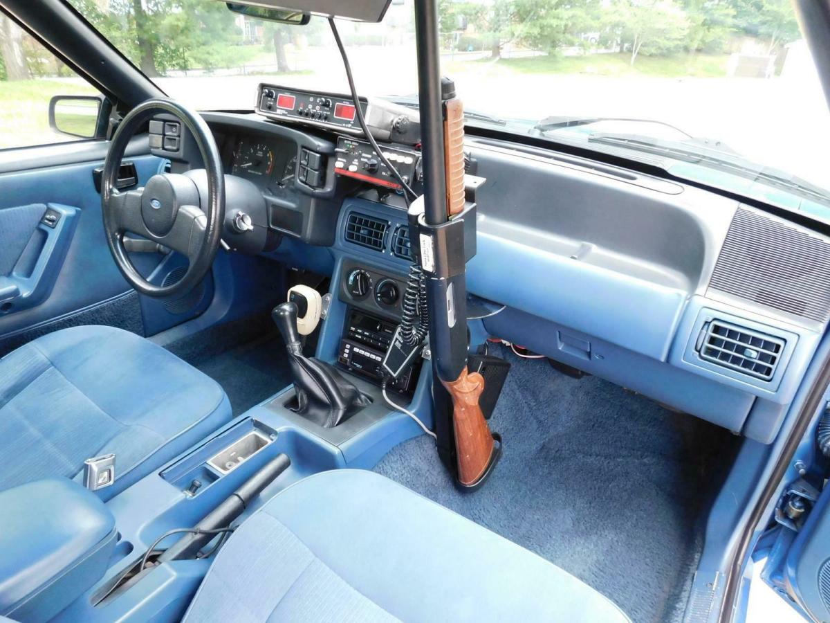 1989 Blue Ford Mustang --