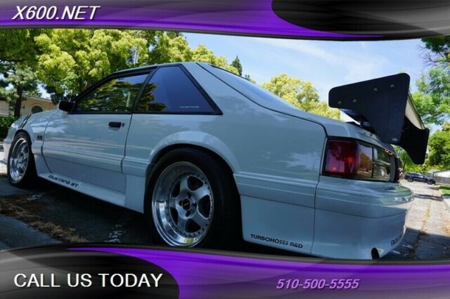 1989 White Ford Mustang --