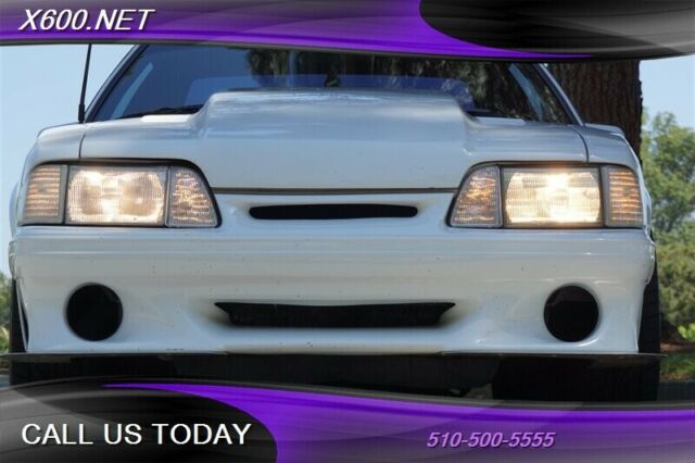 1989 White Ford Mustang --