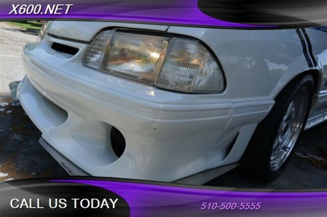 1989 White Ford Mustang --