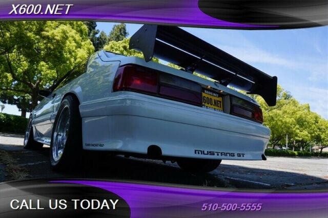 1989 White Ford Mustang --