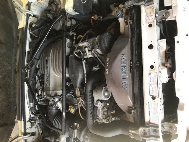 1989 White Ford Mustang Convertible