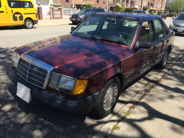 1989 Burgundy Mercedes-Benz 300-Series Sedan