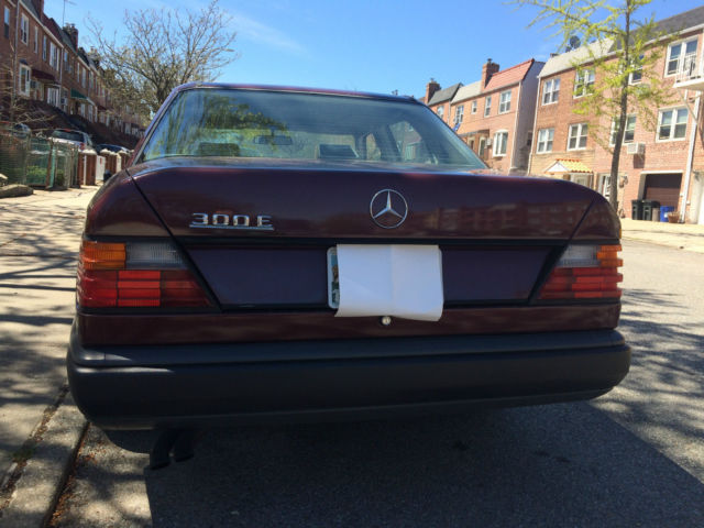 1989 Burgundy Mercedes-Benz 300-Series Sedan