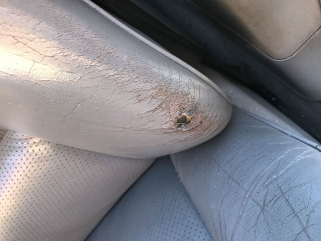 1989 white Mercedes-Benz 500-Series sedan