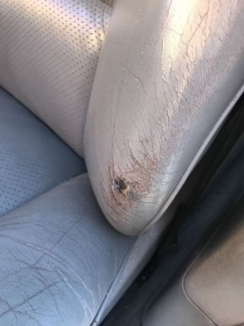 1989 white Mercedes-Benz 500-Series sedan