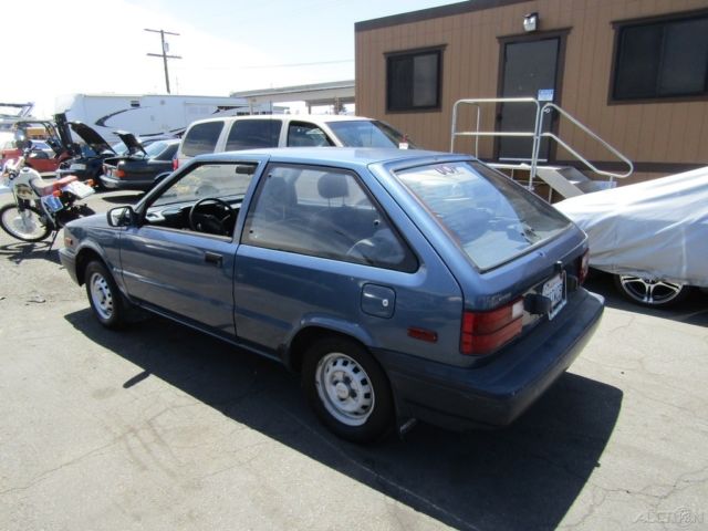 1989 Blue Mitsubishi Precis