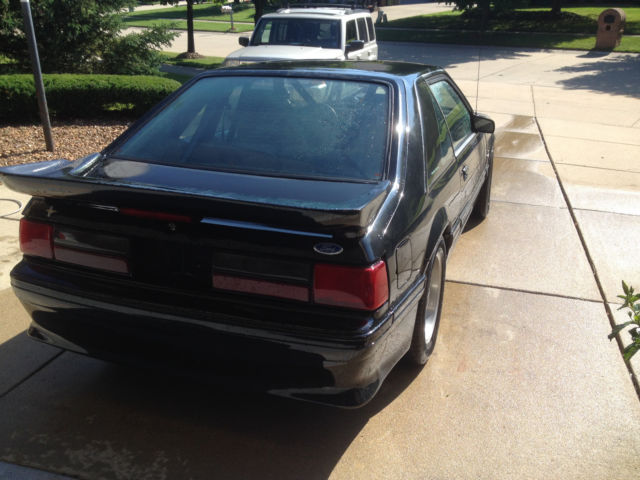 1989 Maroon Ford Mustang Hatchback