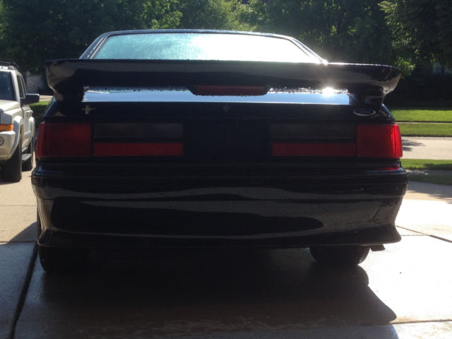 1989 Maroon Ford Mustang Hatchback