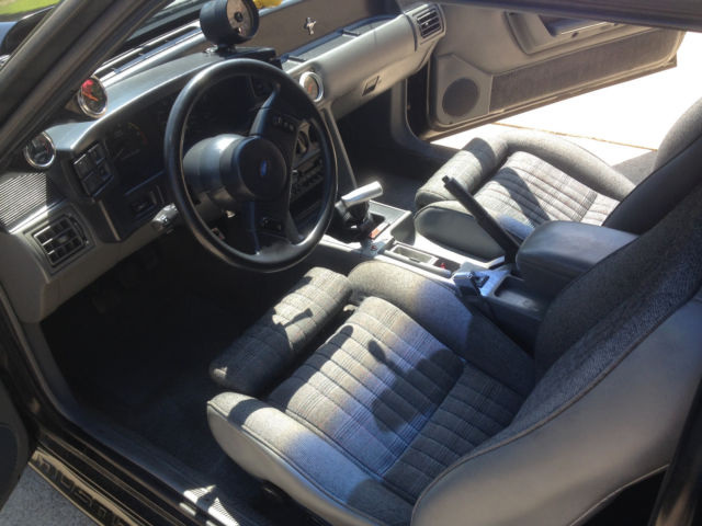 1989 Maroon Ford Mustang Hatchback