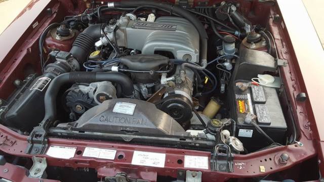1989 Maroon Ford Mustang Hatchback