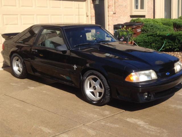 1989 Maroon Ford Mustang Hatchback
