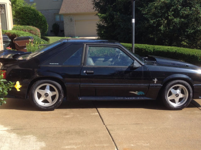 1989 Maroon Ford Mustang Hatchback