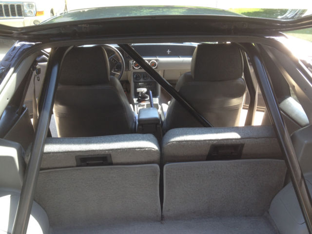 1989 Maroon Ford Mustang Hatchback