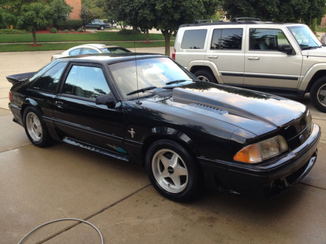 1989 Maroon Ford Mustang Hatchback