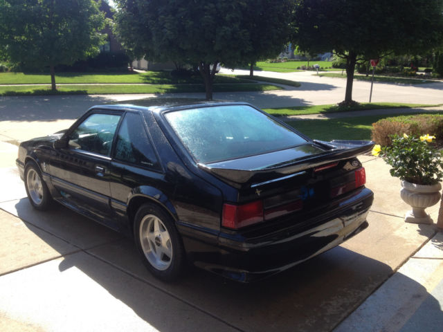 1989 Maroon Ford Mustang Hatchback