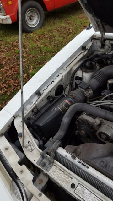 1989 White Ford Mustang Convertible