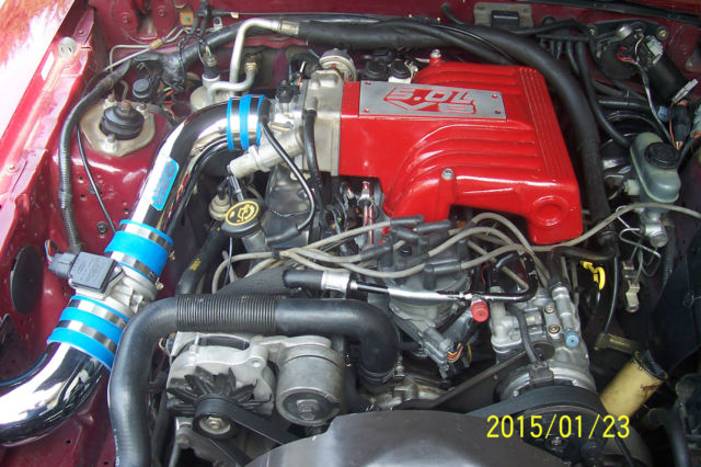 1989 Red Ford Mustang Convertible