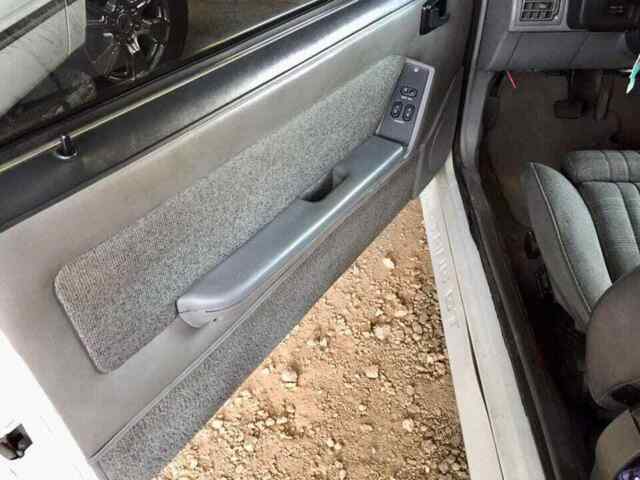 1989 White Ford Mustang Hatchback