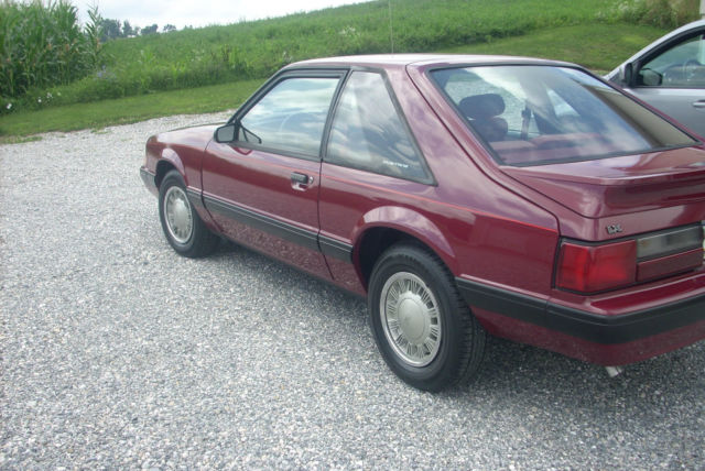1989 Burgundy Ford Mustang Hatchback