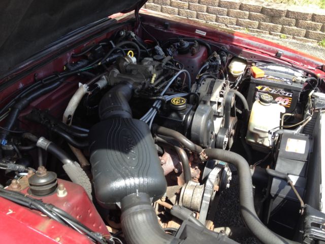 1989 Red Ford Mustang Coupe