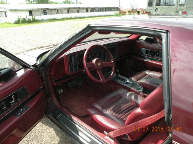 1989 red Buick Reatta Coupe