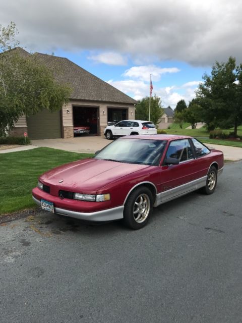 1989 Red Oldsmobile Cutlass Coupe
