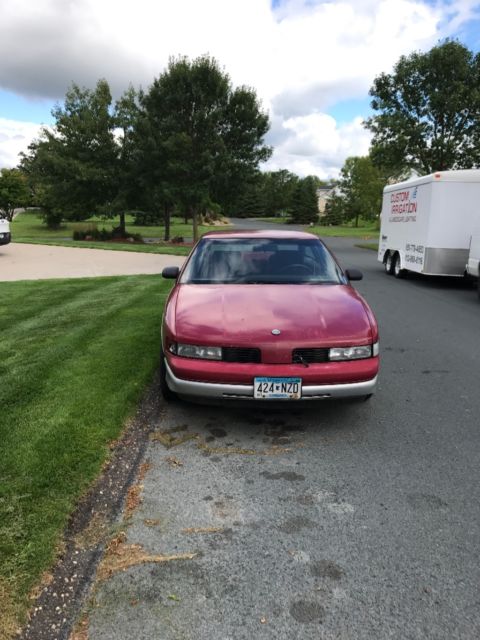 1989 Red Oldsmobile Cutlass Coupe