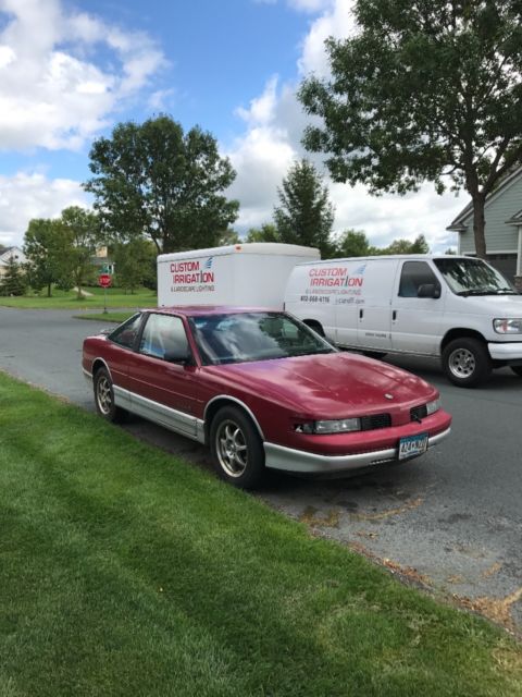 1989 Red Oldsmobile Cutlass Coupe