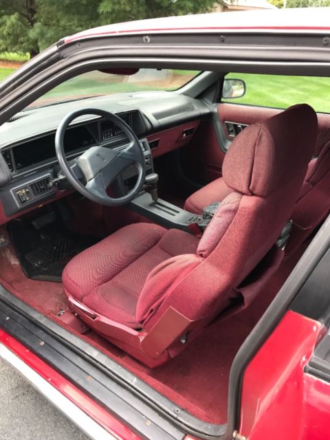 1989 Red Oldsmobile Cutlass Coupe