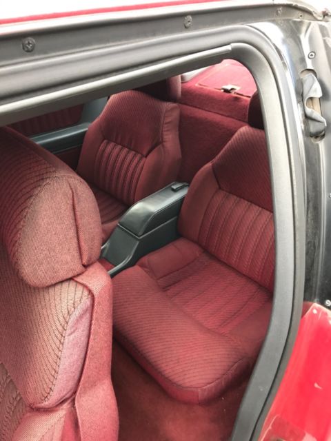 1989 Red Oldsmobile Cutlass Coupe