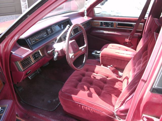 1989 red /burgandy Oldsmobile Ninety-Eight Sedan