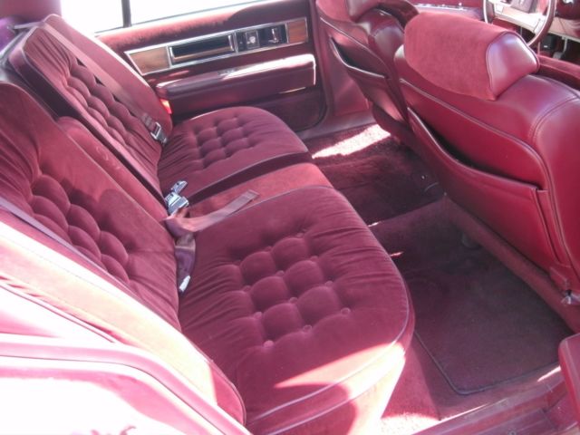 1989 red /burgandy Oldsmobile Ninety-Eight Sedan
