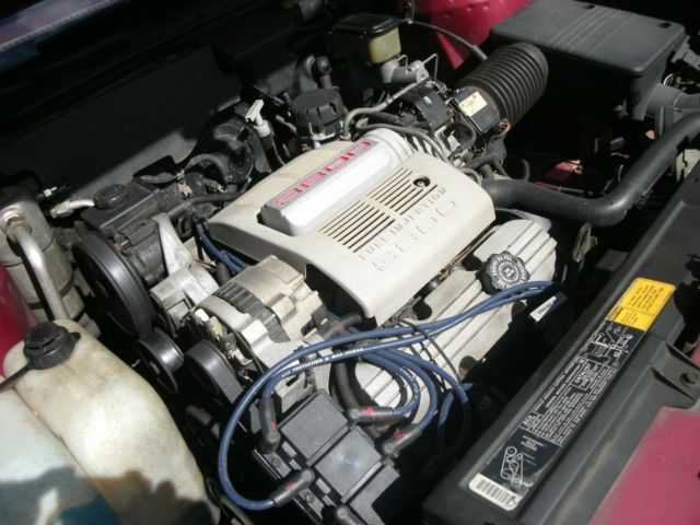 1989 red /burgandy Oldsmobile Ninety-Eight Sedan