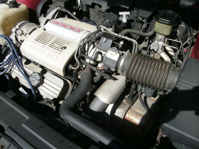 1989 red /burgandy Oldsmobile Ninety-Eight Sedan