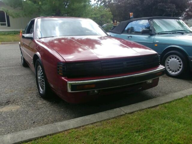 1989 Burgundy Oldsmobile Toronado Coupe