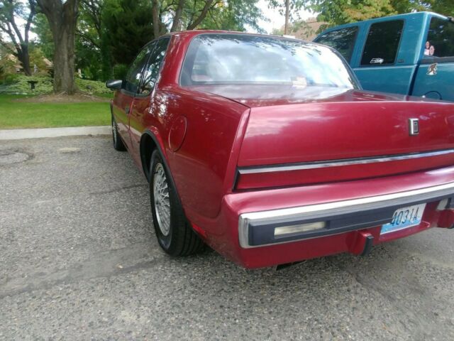 1989 Burgundy Oldsmobile Toronado Coupe