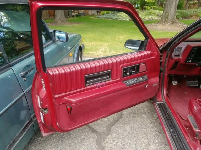 1989 Burgundy Oldsmobile Toronado Coupe