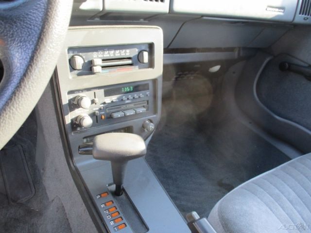 1989 White Pontiac Grand Am Coupe