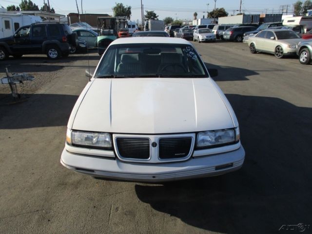 1989 White Pontiac Grand Am Coupe