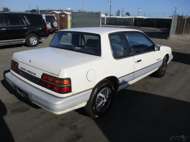 1989 White Pontiac Grand Am Coupe