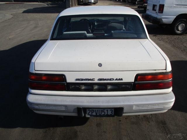 1989 White Pontiac Grand Am Coupe