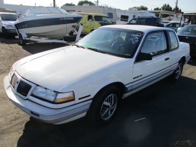 1989 White Pontiac Grand Am Coupe