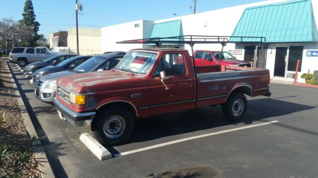 1989 Red Ford F-250 Standard Cab Pickup