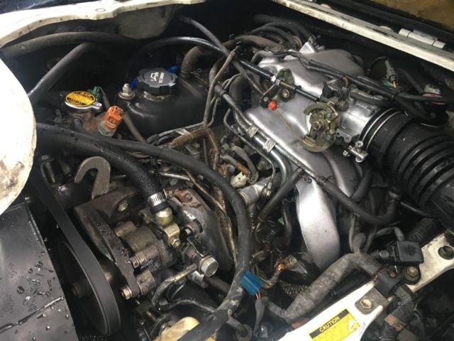 1989 White Toyota Van Minivan