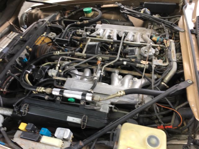 1989 Gold Jaguar XJ-Series Convertible