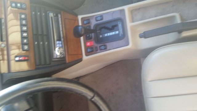 1990 Gold Mercedes-Benz 190-Series Coupe